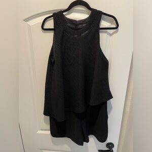 One piece culotte that is so flattering!  Side pockets and lined in polka dots.
